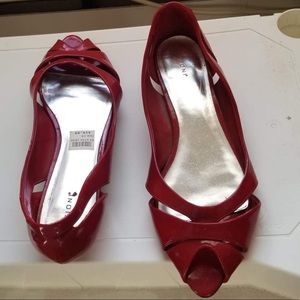 Red low heel open toe shoes